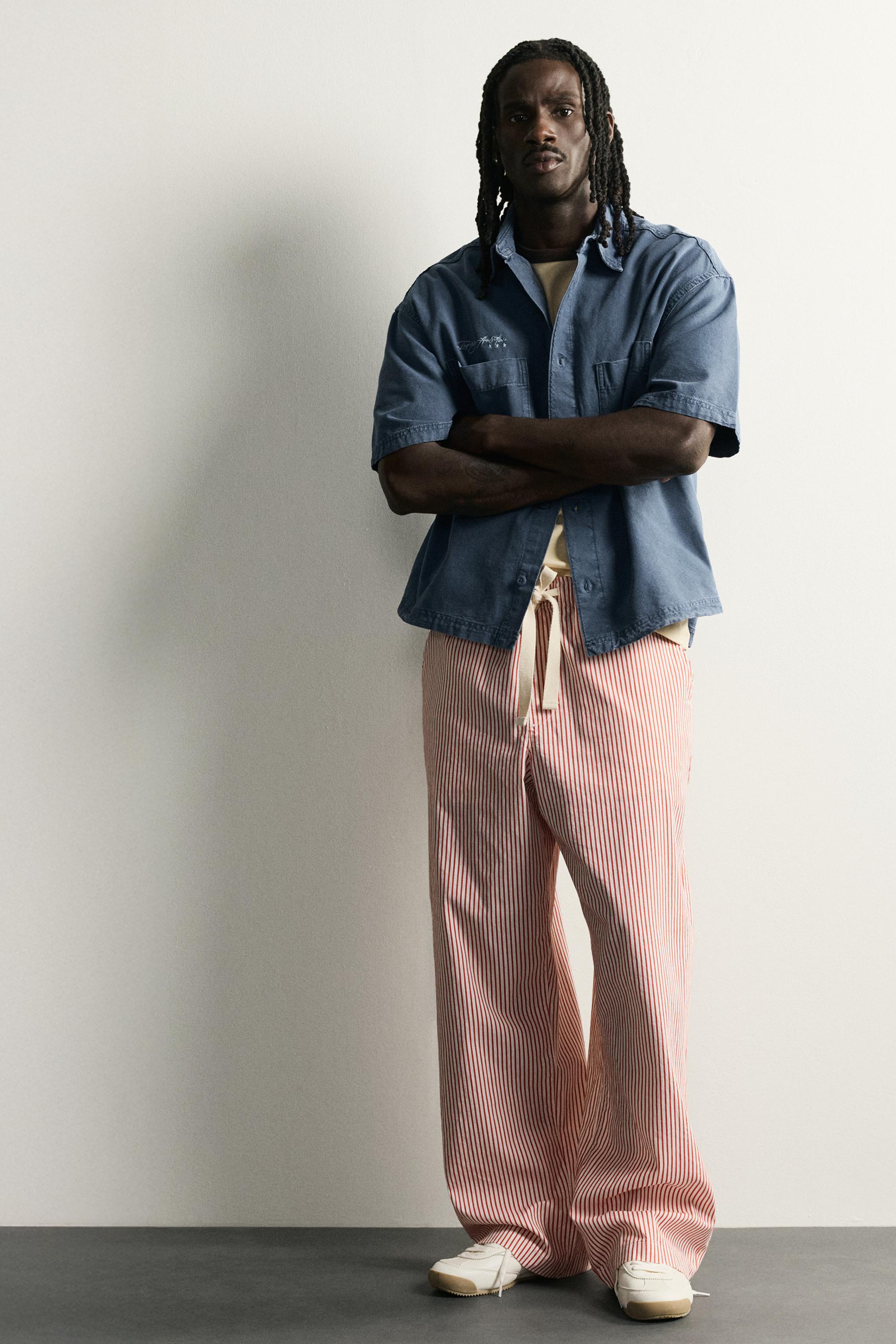 STRIPED BAGGY FIT PANTS